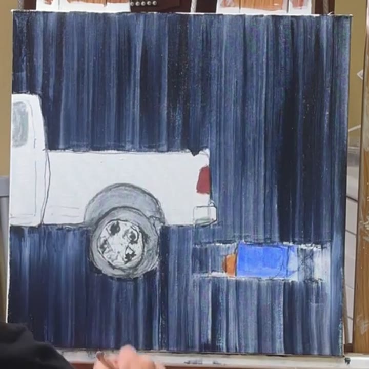 A later studio film still showing the dark blue ground surrounding the white truck and blue stroller.