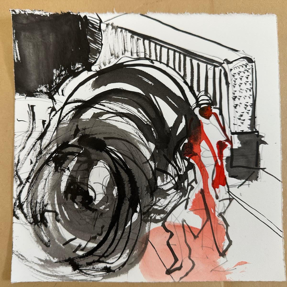 Carolyn’s hand study: an oversized black wheel beside a narrow red figure on white paper.